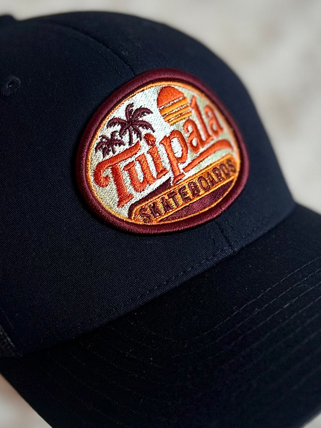 tui trucker hat